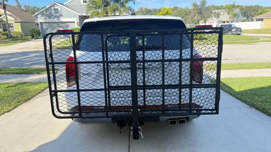 Hitch cargo rack for eTrikes showing folding ramp extended