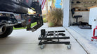 eBike rack lift device for easy handling and storage of heavy bike racks