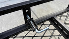 eTrike secured on hitch cargo rack with ratchet straps